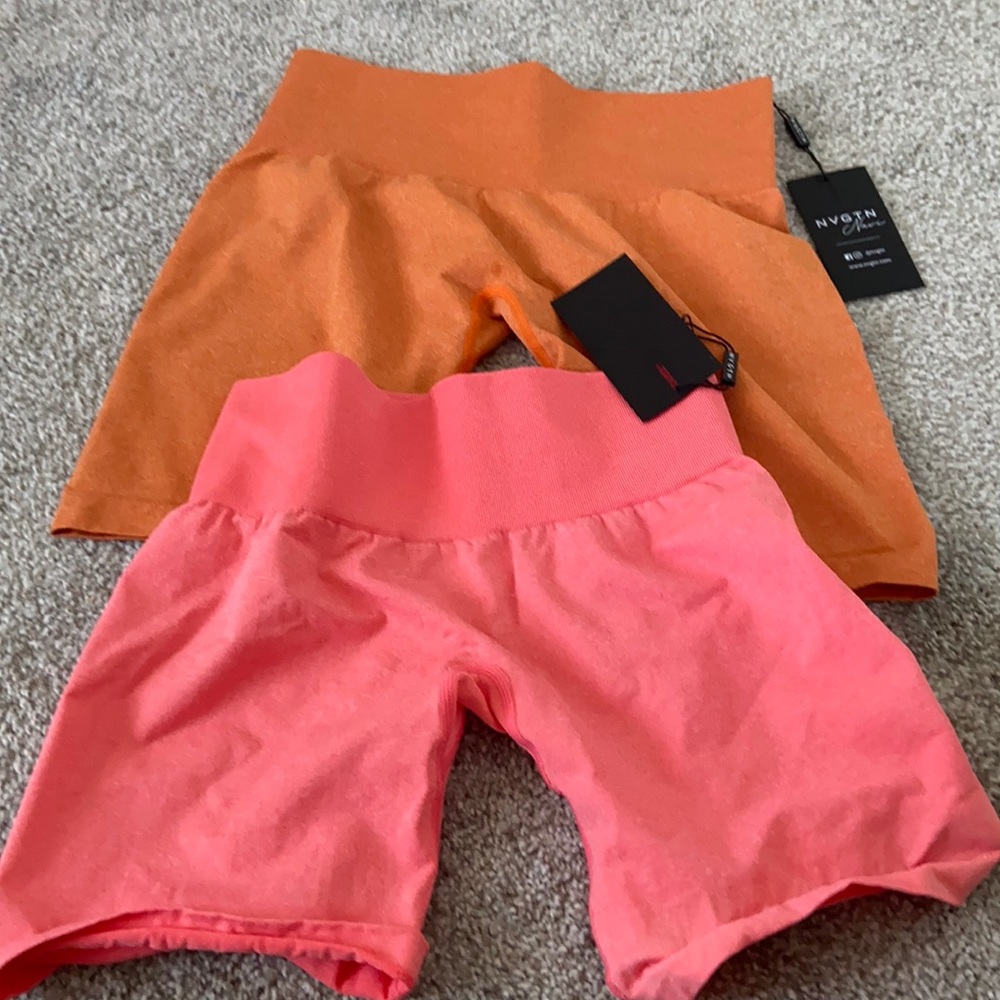 NVGTV shorts with tags.